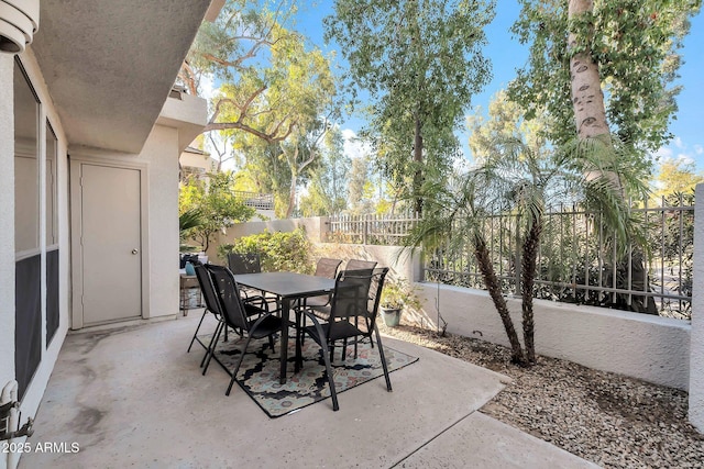 view of patio with a wall mounted AC