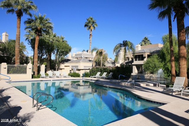 view of swimming pool featuring a patio area