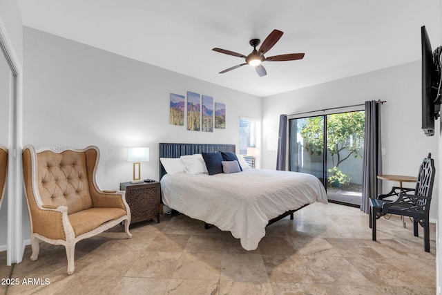 bedroom with access to exterior and ceiling fan