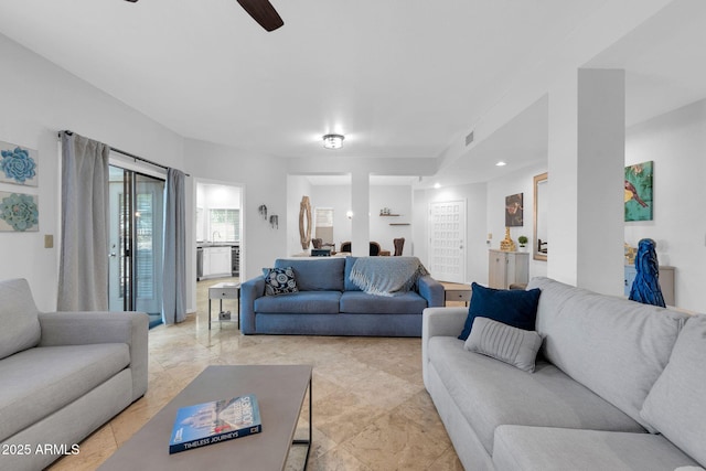 living room featuring ceiling fan