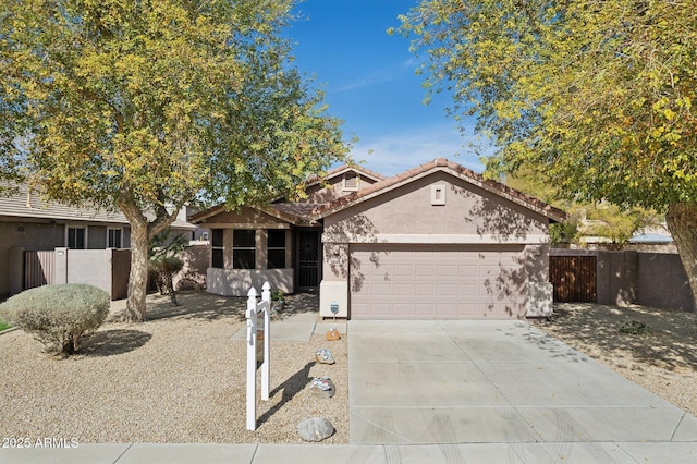 view of front of property featuring a garage