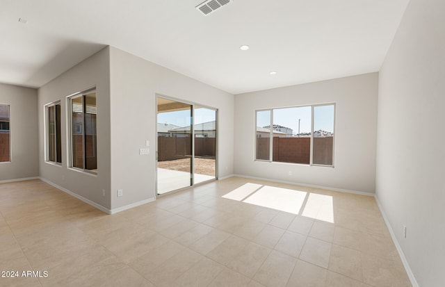 view of tiled spare room