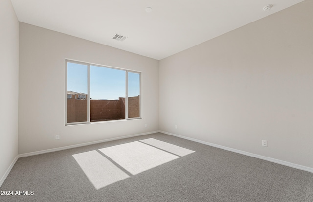 spare room with carpet flooring