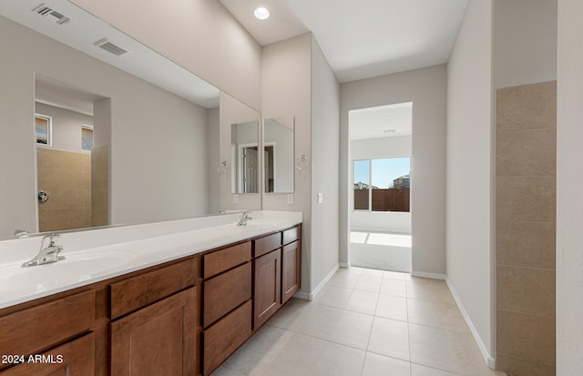 bathroom with vanity, separate shower and tub, and tile patterned flooring