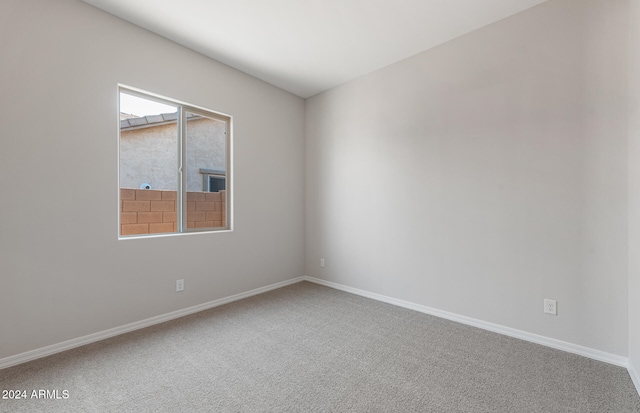 unfurnished room with carpet flooring