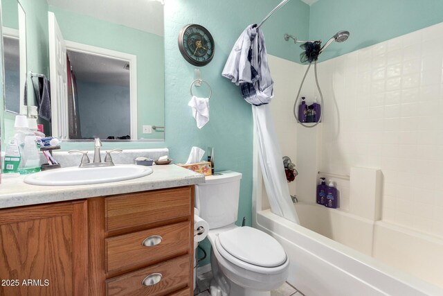 full bathroom with vanity, shower / bath combination with curtain, and toilet