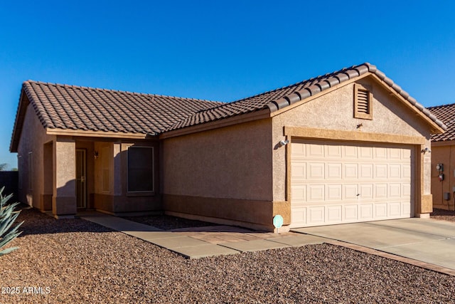 ranch-style house with a garage