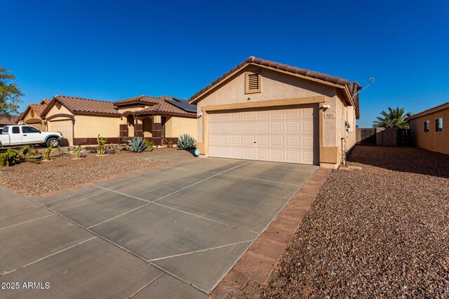 view of front of property with a garage