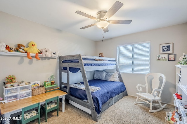 bedroom with baseboards, ceiling fan, and carpet floors