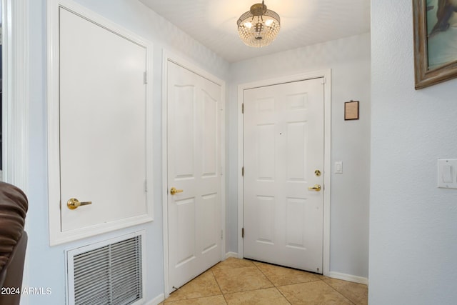 foyer with light tile patterned floors