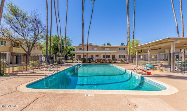 view of swimming pool featuring a patio area