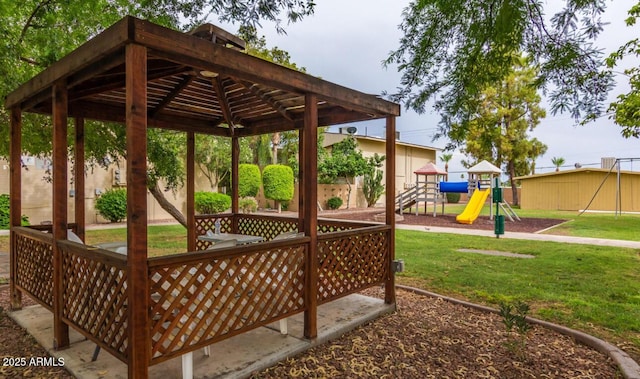 view of community featuring a yard and a playground