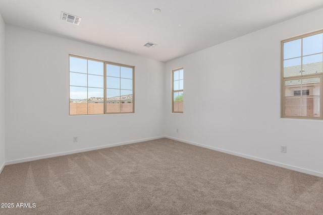12362 W Marguerite Ave, Avondale, AZ 85323 - carpeted empty room featuring plenty of natural light