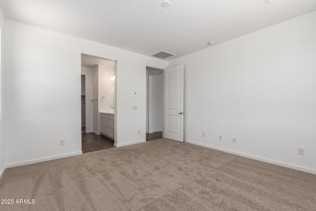 12362 W Marguerite Ave, Avondale, AZ 85323 - unfurnished bedroom with carpet and connected bathroom