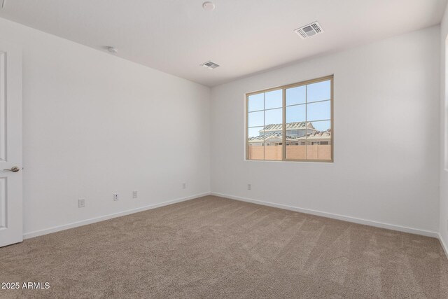 12362 W Marguerite Ave, Avondale, AZ 85323 - carpeted empty room with baseboards and a smoke detector