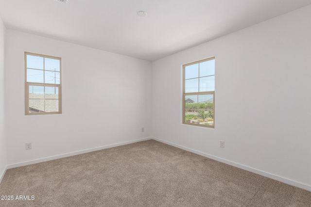 12362 W Marguerite Ave, Avondale, AZ 85323 - spare room with baseboards and carpet flooring