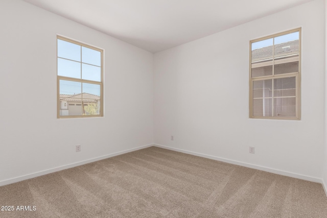12362 W Marguerite Ave, Avondale, AZ 85323 - empty room with carpet flooring and baseboards