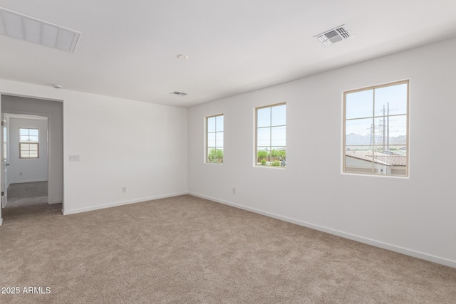 12362 W Marguerite Ave, Avondale, AZ 85323 - unfurnished room featuring light carpet and baseboards