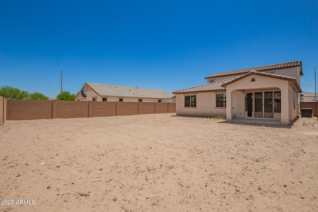 12362 W Marguerite Ave, Avondale, AZ 85323 - rear view of house featuring stucco siding, a fenced backyard, and a tiled roof