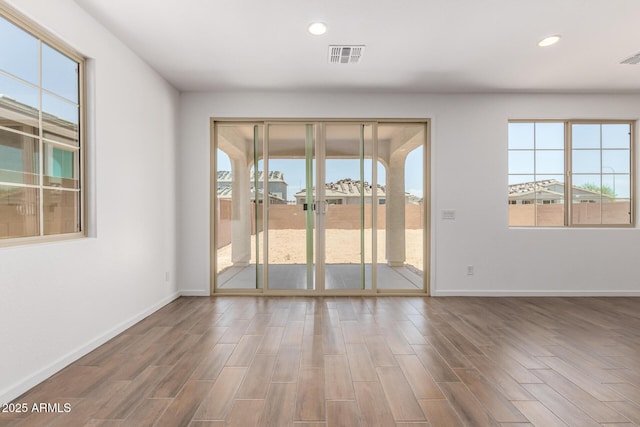 12362 W Marguerite Ave, Avondale, AZ 85323 - unfurnished room featuring recessed lighting and wood finished floors