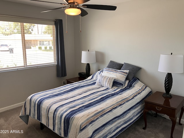 8355 E Via De Encanto, Scottsdale, AZ 85258 - carpeted bedroom featuring a ceiling fan and baseboards