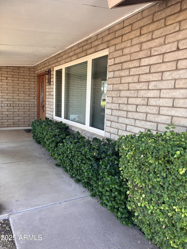 8355 E Via De Encanto, Scottsdale, AZ 85258 - property entrance featuring brick siding