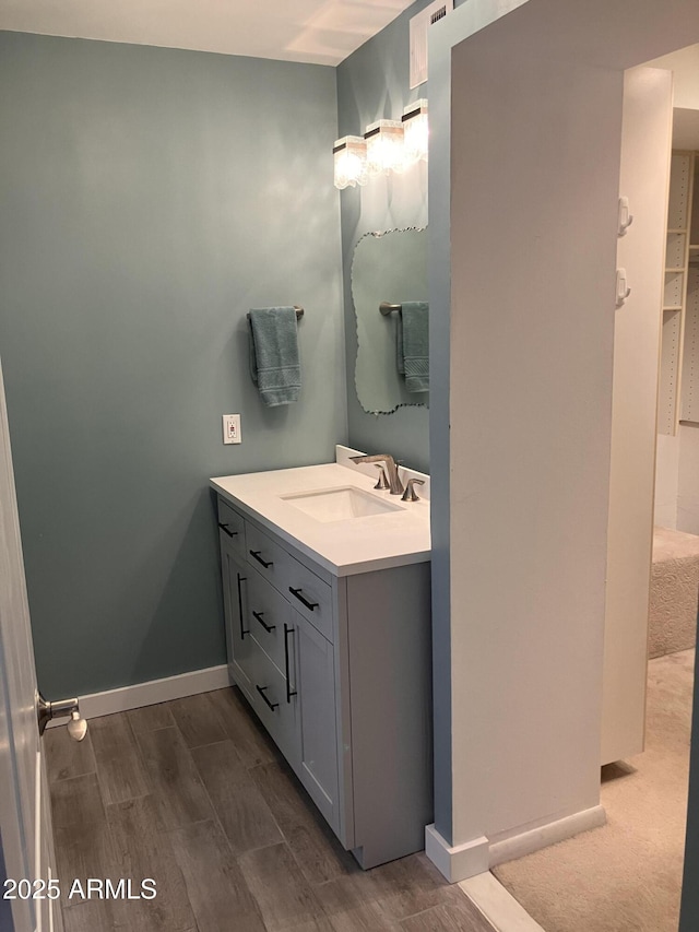 8355 E Via De Encanto, Scottsdale, AZ 85258 - bathroom featuring vanity and wood finished floors