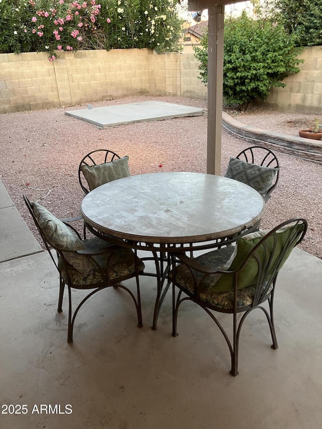 8355 E Via De Encanto, Scottsdale, AZ 85258 - fenced backyard with outdoor dining area and a patio area