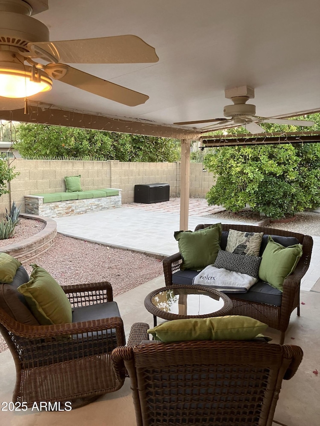 8355 E Via De Encanto, Scottsdale, AZ 85258 - fenced backyard with a ceiling fan, an outdoor living space, and a patio