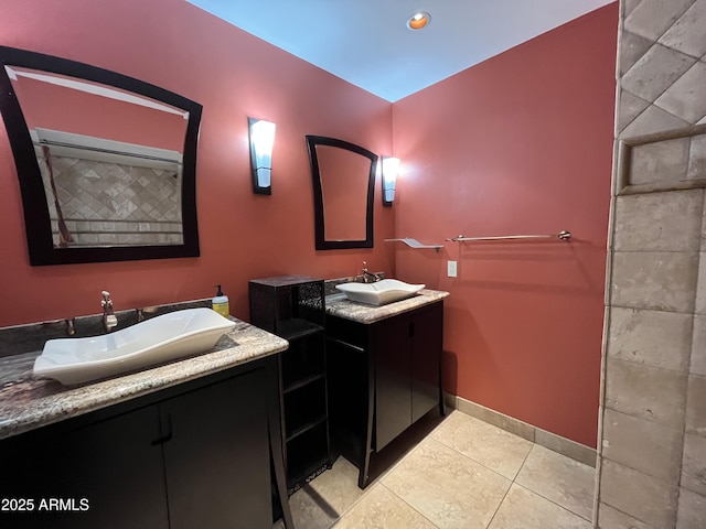 8355 E Via De Encanto, Scottsdale, AZ 85258 - bathroom with two vanities, tile patterned flooring, and recessed lighting