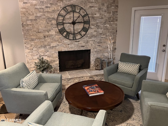 8355 E Via De Encanto, Scottsdale, AZ 85258 - living room featuring a stone fireplace
