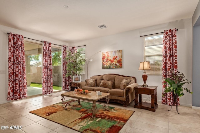 tiled living room with visible vents