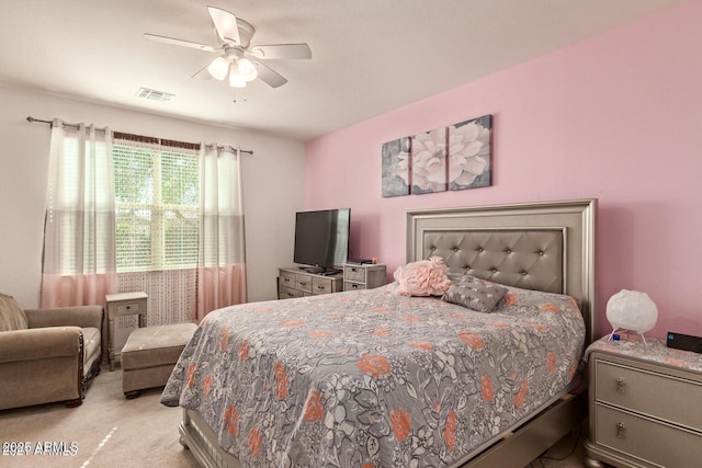 bedroom featuring ceiling fan, carpet flooring, and visible vents