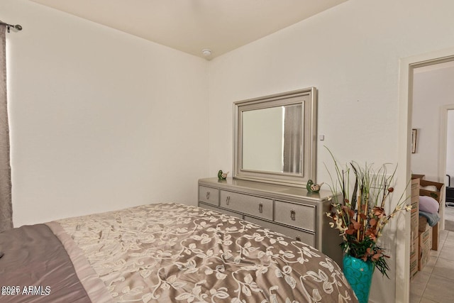 bedroom with tile patterned flooring