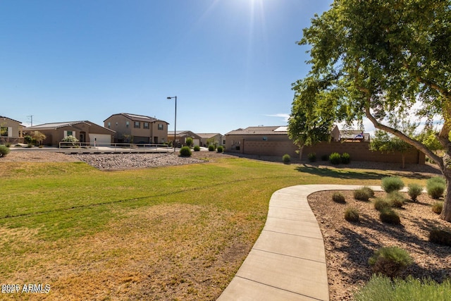 view of yard with a residential view