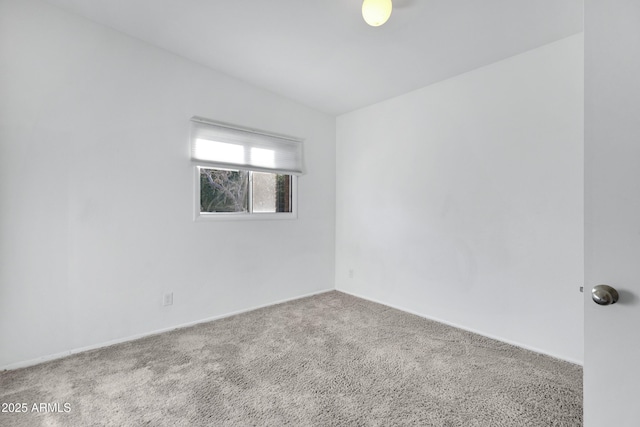 unfurnished room featuring carpet flooring