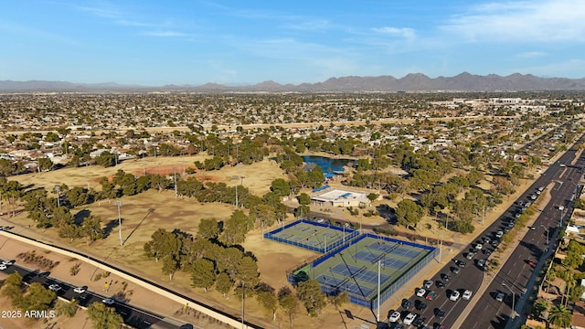 aerial view featuring a water and mountain view