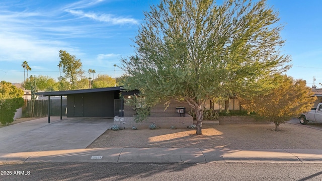 view of front of house featuring a carport