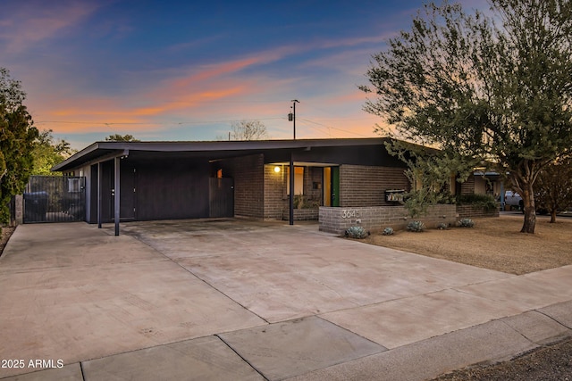 view of front of house with a carport