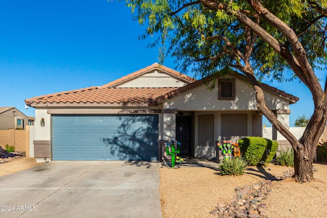 view of front of property featuring a garage