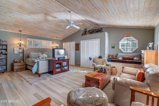 bedroom with lofted ceiling, light hardwood / wood-style floors, ceiling fan, and wood ceiling