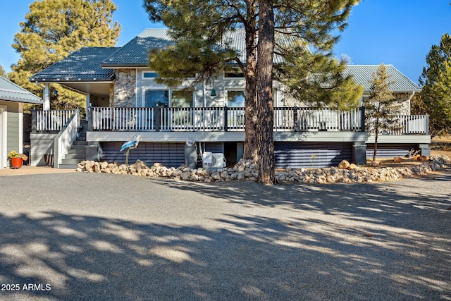 view of front of property with a deck