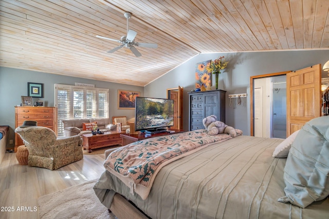 bedroom with wood ceiling, ceiling fan, light hardwood / wood-style floors, and vaulted ceiling