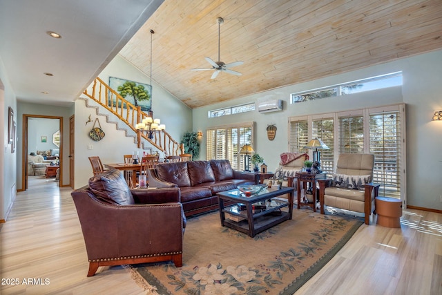 living room featuring high vaulted ceiling, plenty of natural light, wooden ceiling, and a wall unit AC