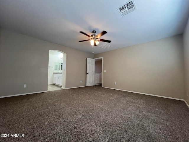 empty room with carpet flooring and ceiling fan