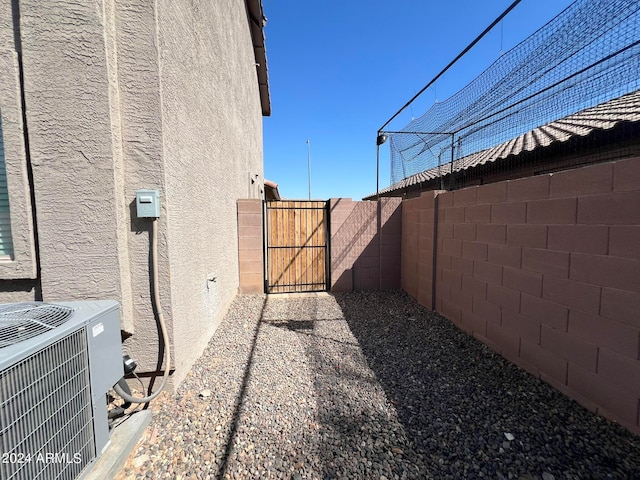 exterior space featuring central AC unit