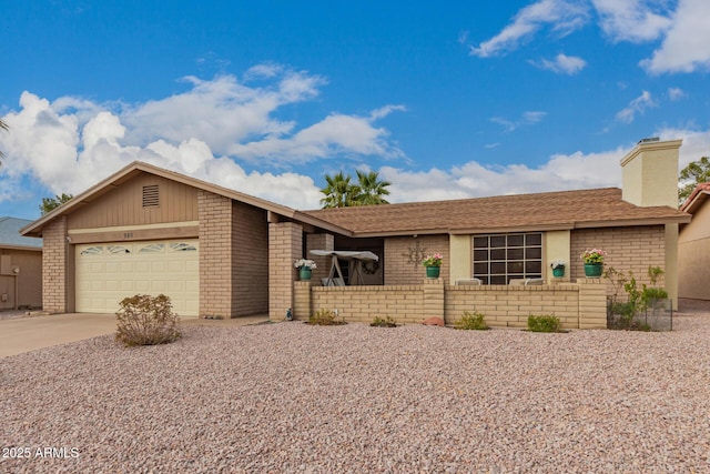 ranch-style home featuring brick siding, a chimney, concrete driveway, and an attached garage