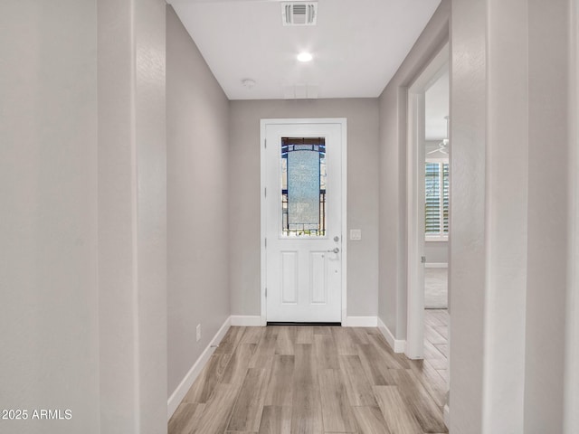 16881 W Merrell St, Goodyear, AZ 85395 - foyer with light wood-style floors, healthy amount of natural light, and baseboards