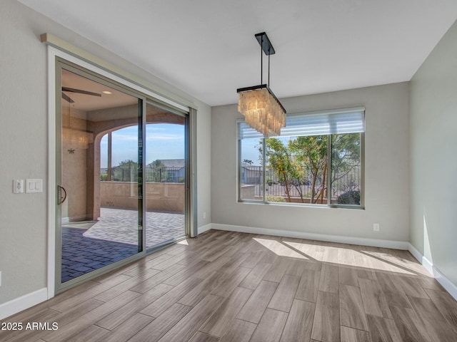 16881 W Merrell St, Goodyear, AZ 85395 - spare room with wood finish floors and baseboards