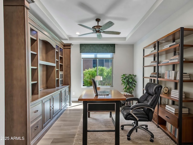 16881 W Merrell St, Goodyear, AZ 85395 - home office featuring a ceiling fan, a raised ceiling, light wood-style flooring, baseboards, and recessed lighting